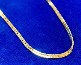 $500. 36" 14K gold. 2mm herringbone necklace. 7.5g. COA avail. 