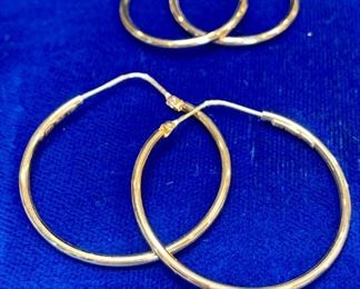 $120. TWO sets of vintage gold hoops. Marked 14K, Italy. 