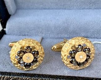 $650. Vintage Lucien Piccard Cufflinks. 14kt. 13 g. Diamond center with black star sapphire stones. COA avail. 