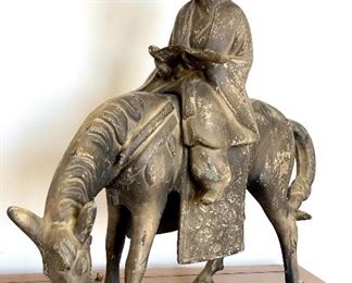 $300 -Toyo Japanese Cast Iron Scholar Sculpture Finely molded to depict a scholar seated on a feeding horse while holding a book in his hands, remnants of original gilt Cast Iron with Bronzed Patina Impressed "Japan" to underside. Please note this sculpture may be difficult to move as he is VERY HEAVY!!  17W 17H