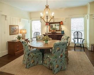 Beautiful dining room w/ 4 parsons chairs, sisal rug, 2 antique sidebaords