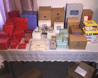 Tables full of vintage Avon collectibles. New in box.