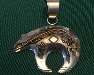 Sterling pendant. Signed Mark Yazzie. 