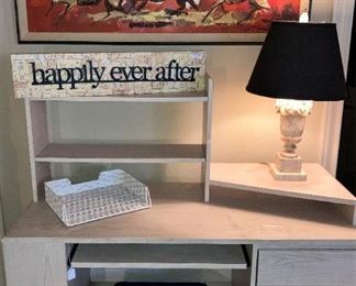 Small computer desk; lamp; small black ottoman