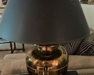One of many brass lamps