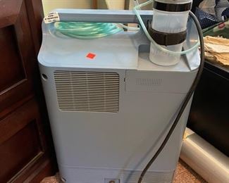 Oxygen Concentrator with O2 bottle and some spare accessories