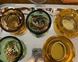 Vintage green and amber glass ash trays... perfect for jewelry! Silver plated serving tray just waiting to be used at your next dinner party!