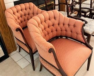 Pair of vintage tufted armchairs.  I can find no maker but they are quality pieces. 