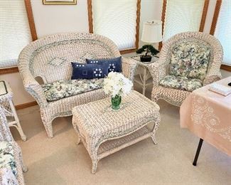 Lovely set of white wicker furniture. There are 8 pieces!