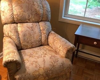 Pretty pale blue floral LaZBoy Recliner and an antique side table. 