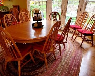 Oak Kitchen table, 2 leaves,  6 chairs,  6 extra chairs available 