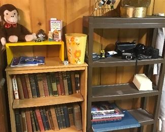 Shelves and vintage books vintage curious George vintage small trashcan vintage cameras