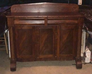 Empire Sideboard, octagonal column supports with scrolled feet.   $600.