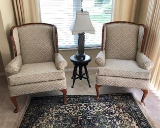 Two beautiful wing back chairs, piano stool and lamp - shown with one of several area rugs