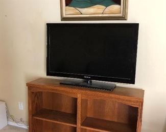 Bookcase shown with TV 