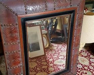 Leather and brass stud framed mirror