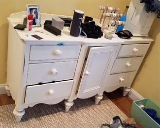 white painted dresser or storage cabinet