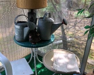 vintage metal patio tables & watering cans