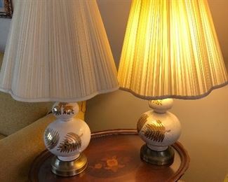 cute pair of retro ceramic lamps with gold fern accents and original scalloped shades
