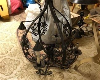 lots of cool retro lights at this house - vintage iron chandelier