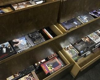 #12 amazing amount of DVDs at this house would like to sell all to one buyer this photo it’s just one cabinet text me 352-279-1816 for more info thank you