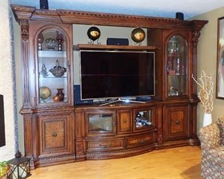 We WILL Pre-Sell this large Detailed Entertainment Center   10' 6" long - 25" deep - 90" tall  -- It comes in  6 --  pieces, so easy for moving.  Please call us if interested,  or want more details. 612-849-3688