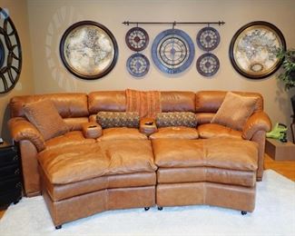 LARGE SUPPLE LEATHER COUCH W/  2 -- LEATHER OTTOMANS - ONE OTTOMAN HAS STORAGE  -- COUCH IS 14' LONG  28" DEEP -- 