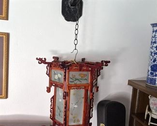 Hanging Chinese lanterns with plastic dragon  hanger.  Hexagonal Lantern Circa 1950's there are two of these. Priced at $395 each 