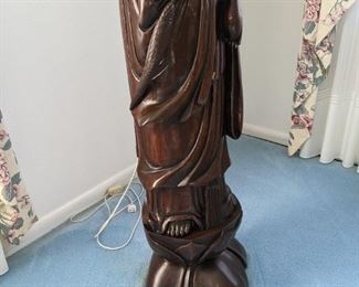 4ft (plus) Hardwood ( Rosewood/Teak) Kwan Yin Statue standing on Lotus Flower.  Floor Lamp is made from the root craving.  This was bought during the mid 1960's to mid 1970's.  The owner lived in Hong Kong from the late 1950's to mid 1970's.  This piece is very elegant and holds great peace. $3000