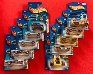 Hot Wheels no. 002, 002, 005, 005, 023, 041, 053, 056, 056, 059.