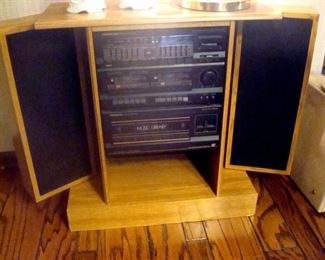 Cabinet with pivot speakers. Stereo is sound Design.