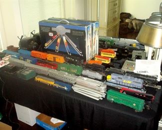 Lionel & other trains and accessories including track which is not shown.