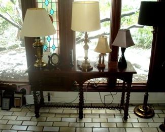 Antique six leg turned leg sofa table, floor & table lamps.