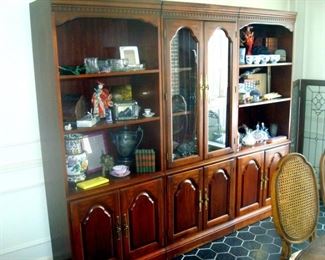 Three section dining room cabinets and contents.