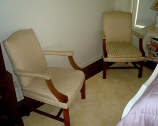 Pair Chippendale style upholstered arm chairs.