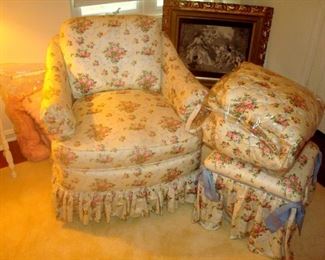 Bedroom chair & ottoman with matching comforter & curtains.