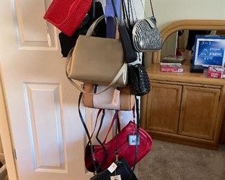 Handbags galore, most new with tags