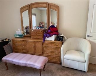 White leather swivel chair, lilac bench