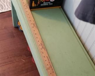 Wooden painted green bench