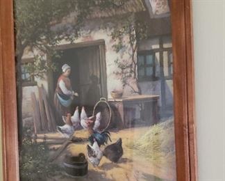 Framed print of lady feeding chickens
