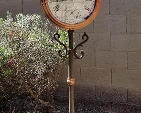 Outdoor weather vane clock