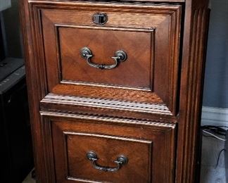 Wooden two drawer file cabinet.