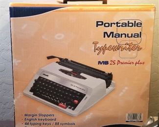Brand new portable manual typewriter.