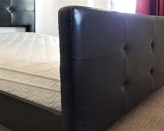 Black tufted Queen Bed with matching foot board