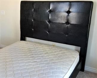 Black tufted Queen Bed with matching foot board