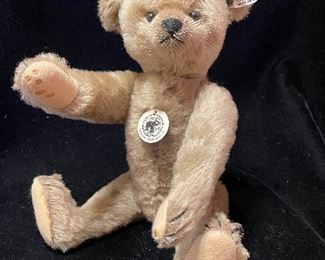 $235.00
1908 Replica Teddy Bear with Growler 
EAN 408007 12” Mohair 
LE 2/1908 ear button has long F 
With box and COA 