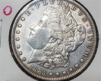 Lots of old morgan silver dollars and other silver coins in this auction. 