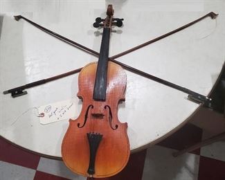 antique hand made violin / fiddle with bows that need restringing. 