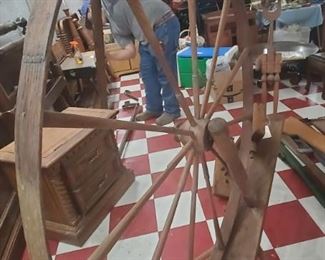 primitive antique wooden spinning wheel