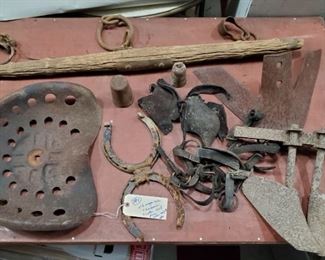 farm primitives old tractor seat, wagon yoke cast iron plows cotton scale weights etc